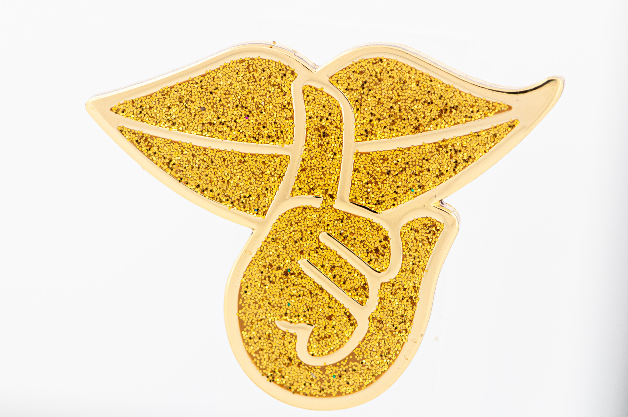 Guldpläterad pin med glitter