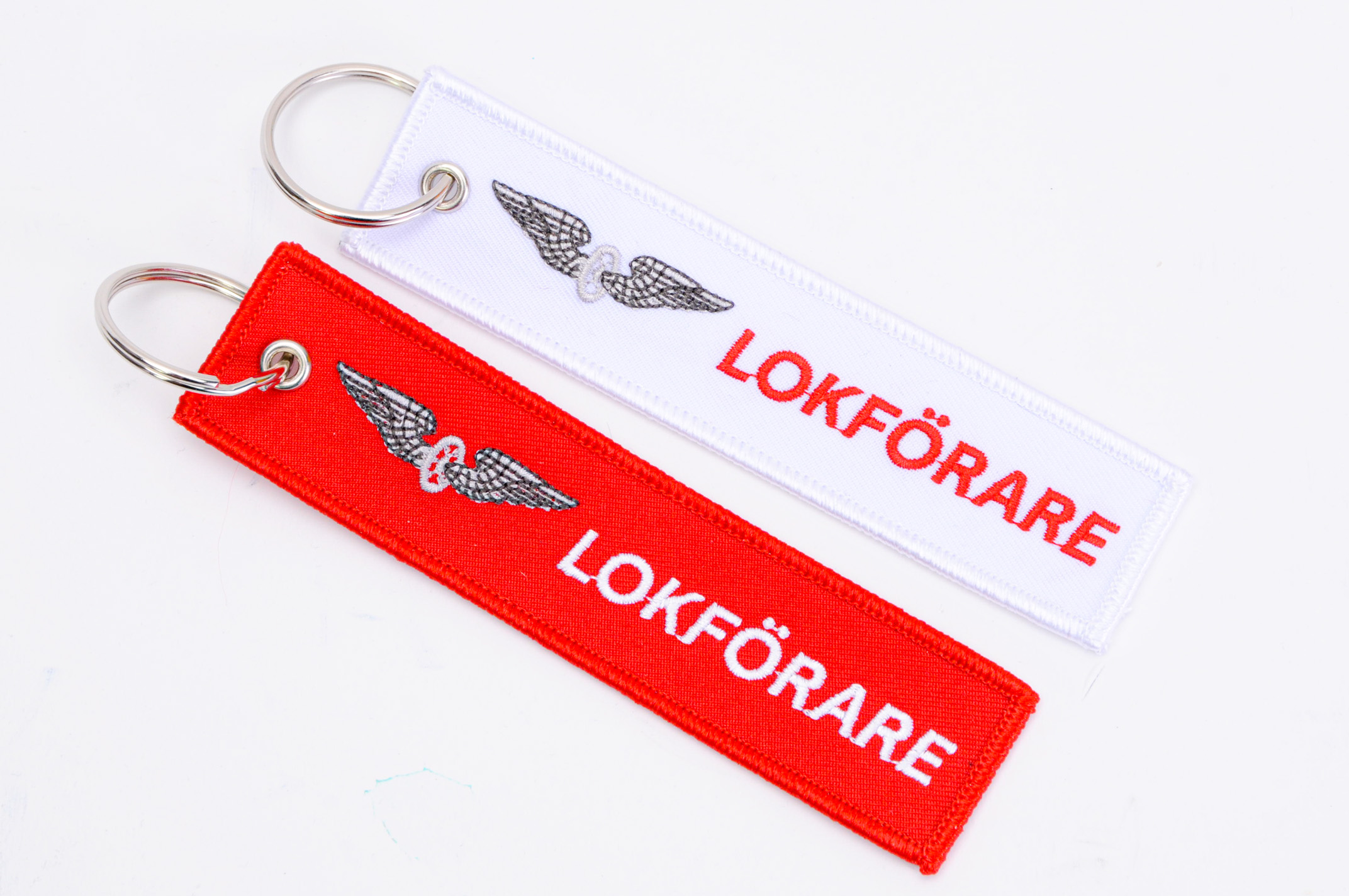 Broderade nyckelringar